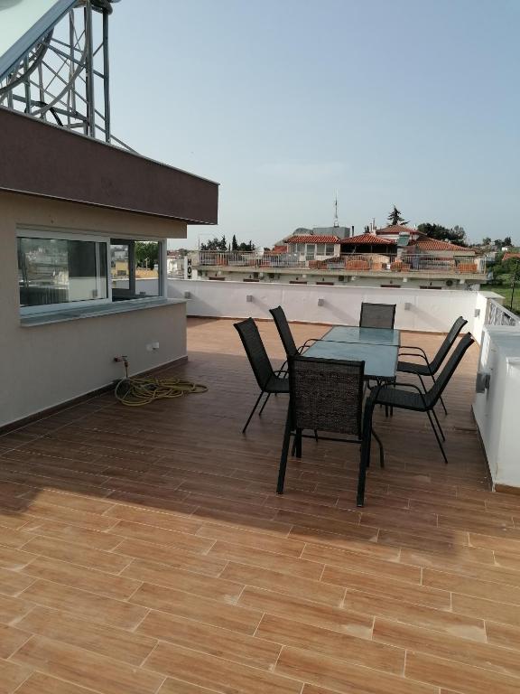 Ein Balkon oder eine Terrasse in der Unterkunft Crystal Blue Apartments