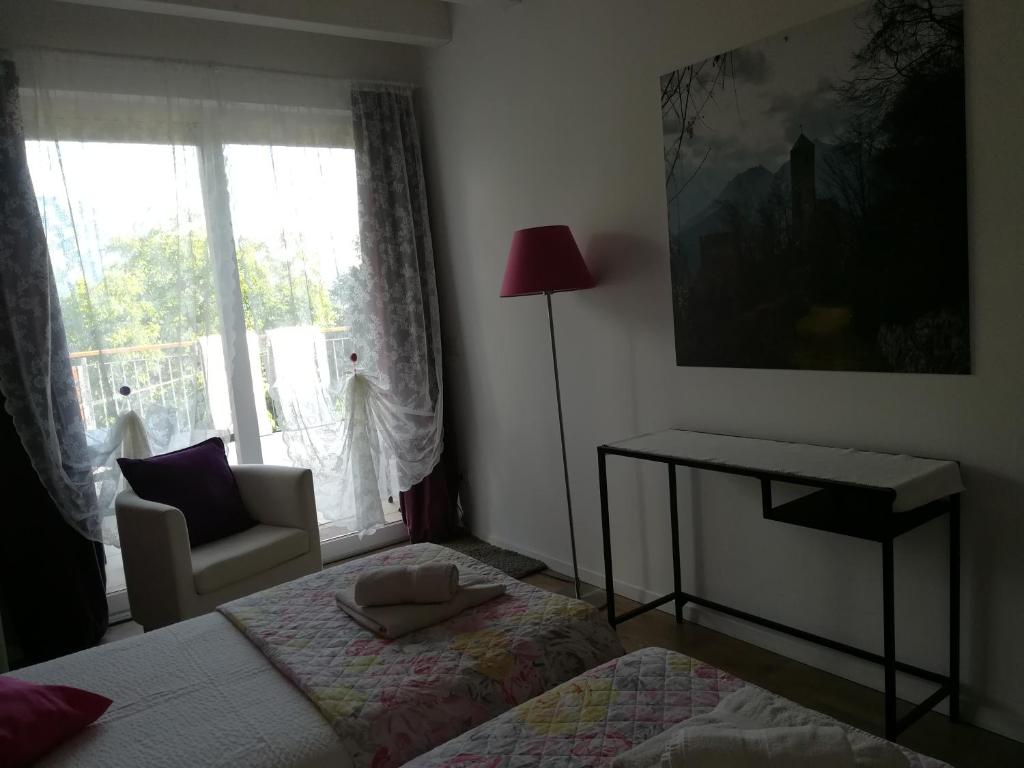 Postel nebo postele na pokoji v ubytování B&B Aria d'Argento & Relax Home
