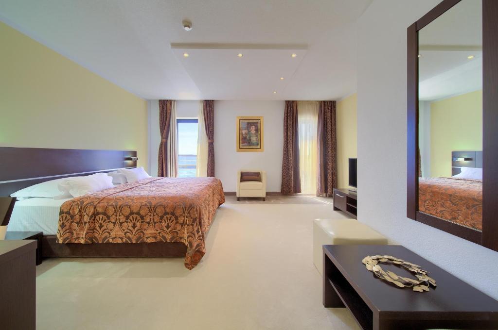 Postel nebo postele na pokoji v ubytování Hotel Marina