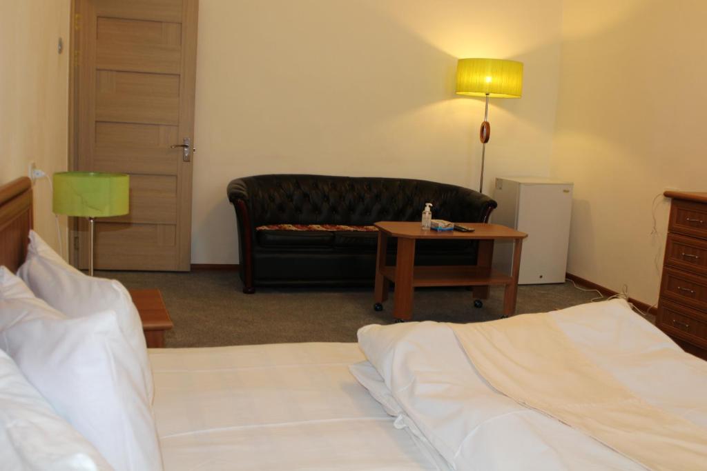 Postel nebo postele na pokoji v ubytování Diligence Hotel & restaurant