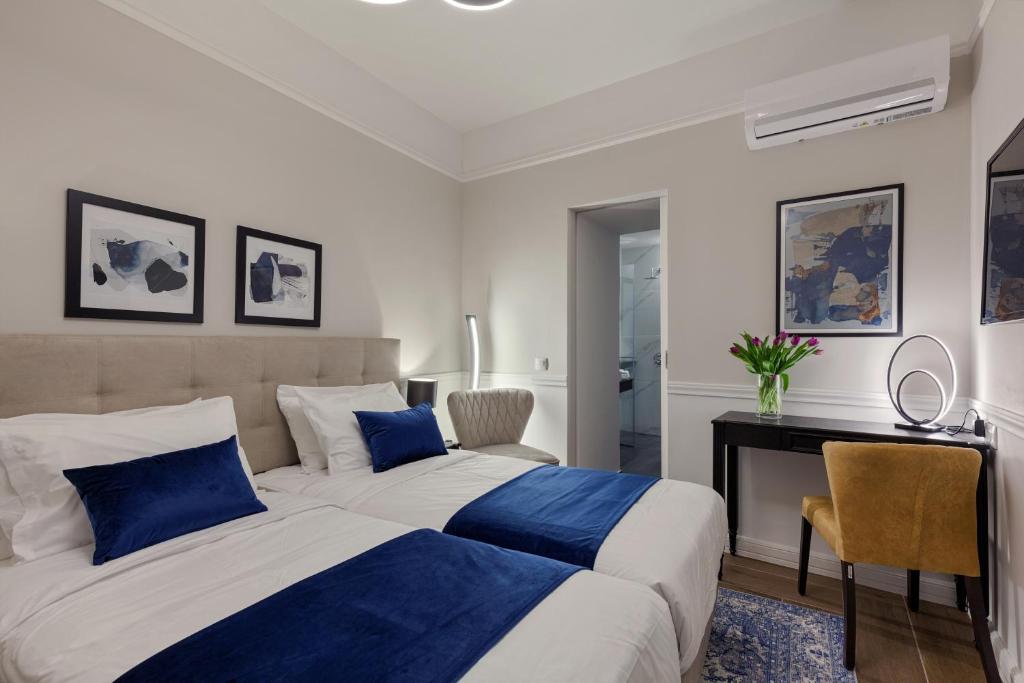 Posteľ alebo postele v izbe v ubytovaní Classic Hotel by Athens Prime Hotels