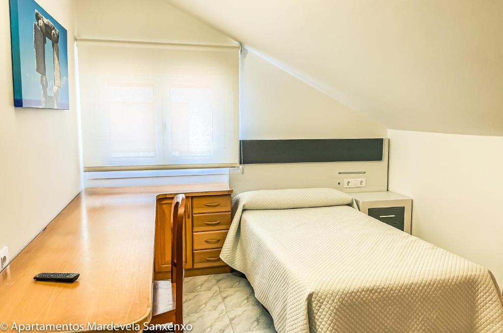 Postel nebo postele na pokoji v ubytování Apartamento Mardevela