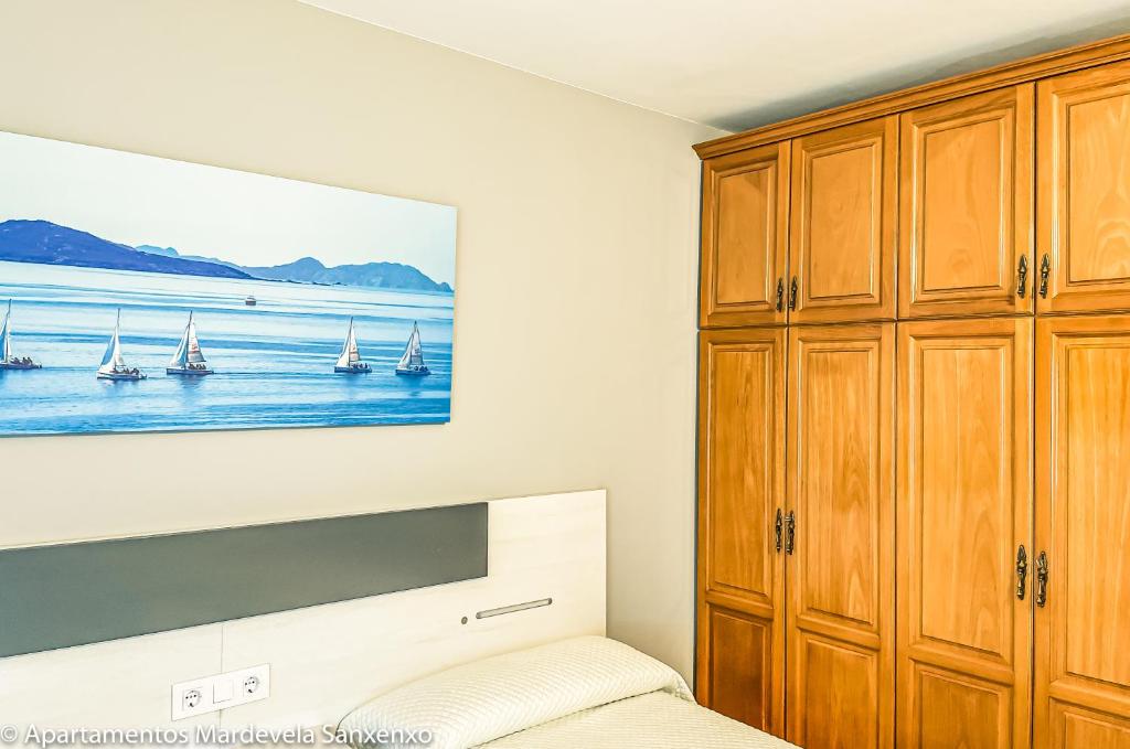 Postel nebo postele na pokoji v ubytování Apartamento Mardevela