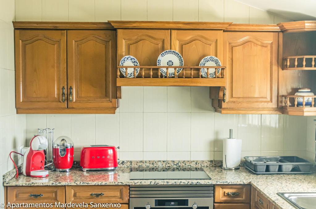 Kuchyň nebo kuchyňský kout v ubytování Apartamento Mardevela
