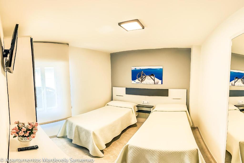 Postel nebo postele na pokoji v ubytování Apartamento Mardevela