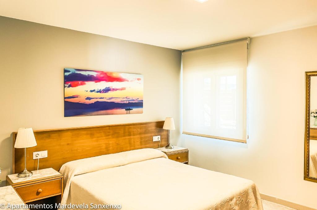 Postel nebo postele na pokoji v ubytování Apartamento Mardevela