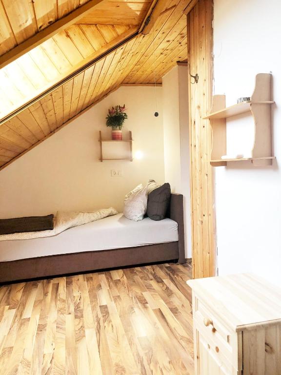 Postel nebo postele na pokoji v ubytování Balaton Apartman Paloznak