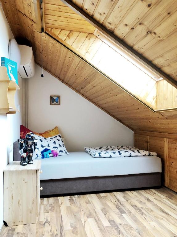 Postel nebo postele na pokoji v ubytování Balaton Apartman Paloznak