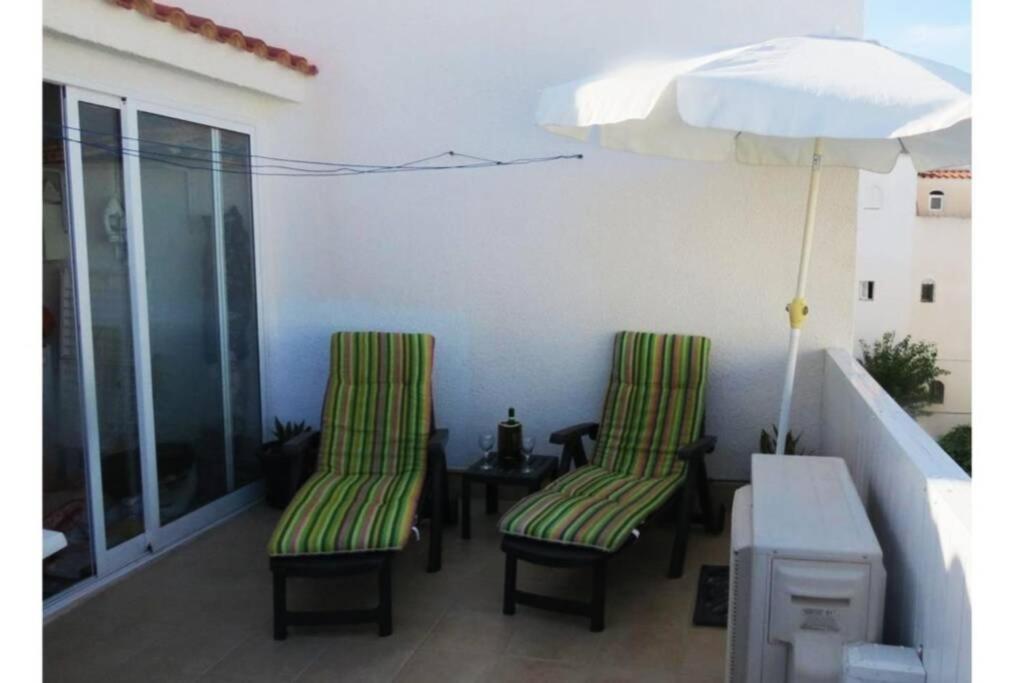 A seating area at Beautiful Air Conditioned bungalow - Alkabir