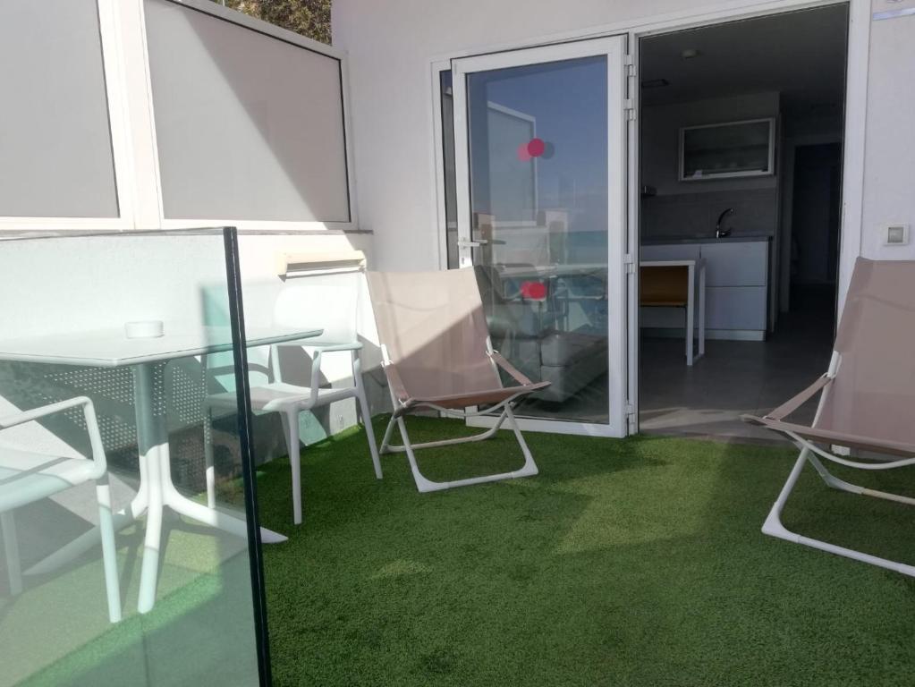 Patio lub wspólna przestrzeń na świeżym powietrzu w obiekcie Puerto Príncipe