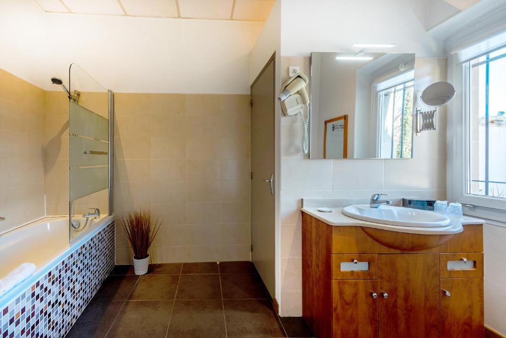 Koupelna v ubytování Hotel Sainte Anne - Apt