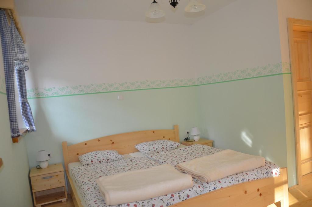 Postel nebo postele na pokoji v ubytování Farmhouse Štiftar