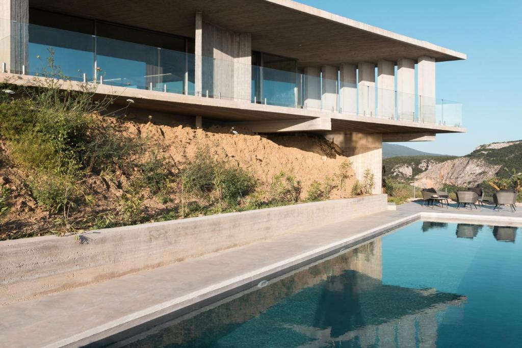 The swimming pool at or close to Unique Villa Ori sleeps8 private pool Gialova