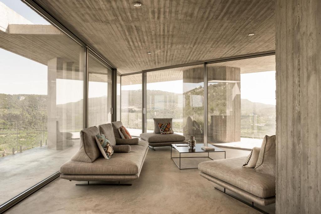A seating area at Unique Villa Ori sleeps8 private pool Gialova