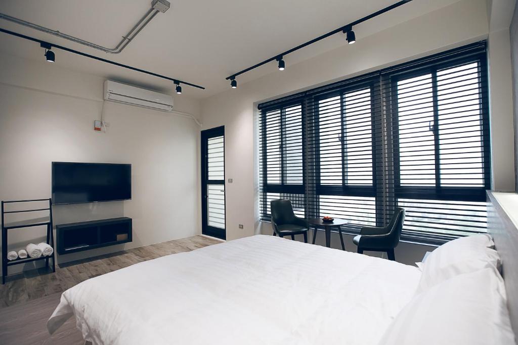 Postel nebo postele na pokoji v ubytování King Win Homestay