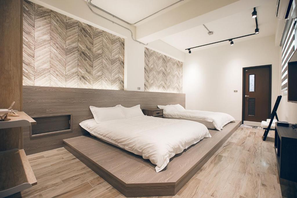 Postel nebo postele na pokoji v ubytování King Win Homestay