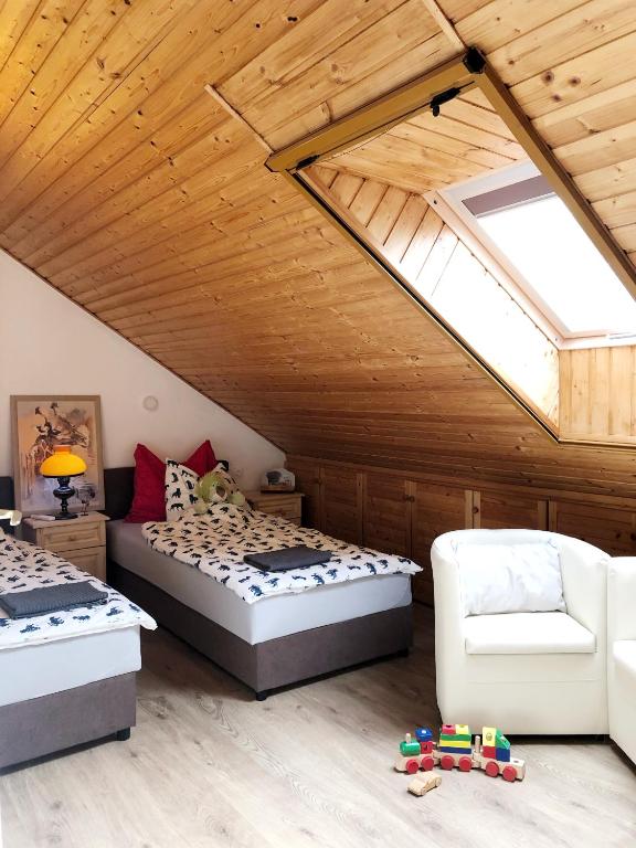 Postel nebo postele na pokoji v ubytování Balaton Apartman Paloznak