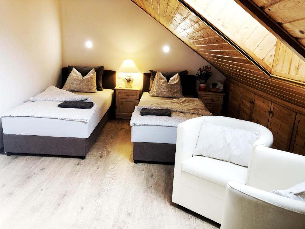 Postel nebo postele na pokoji v ubytování Balaton Apartman Paloznak