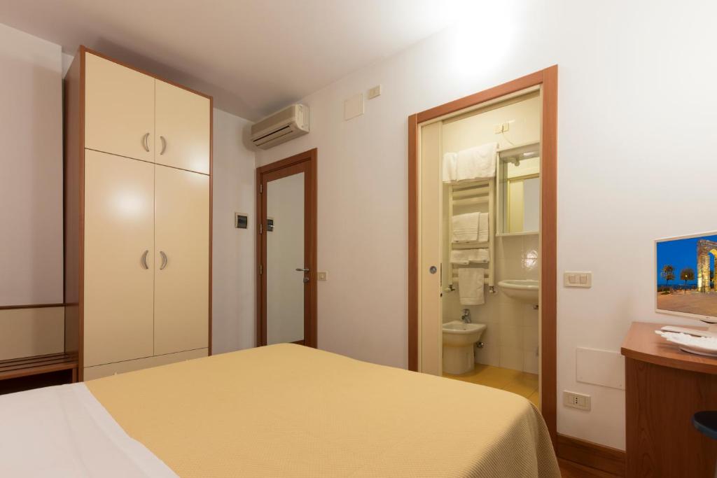 Postel nebo postele na pokoji v ubytování B&B Morelli