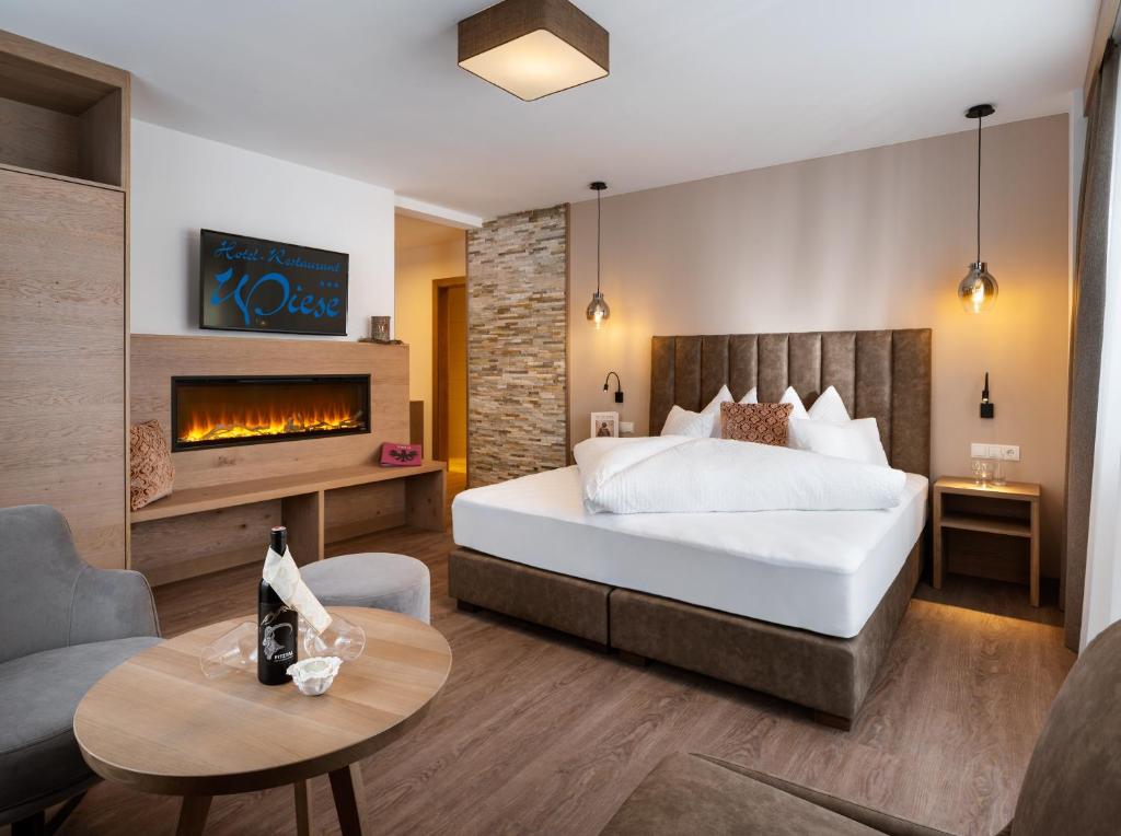 Postel nebo postele na pokoji v ubytování Hotel Wiese