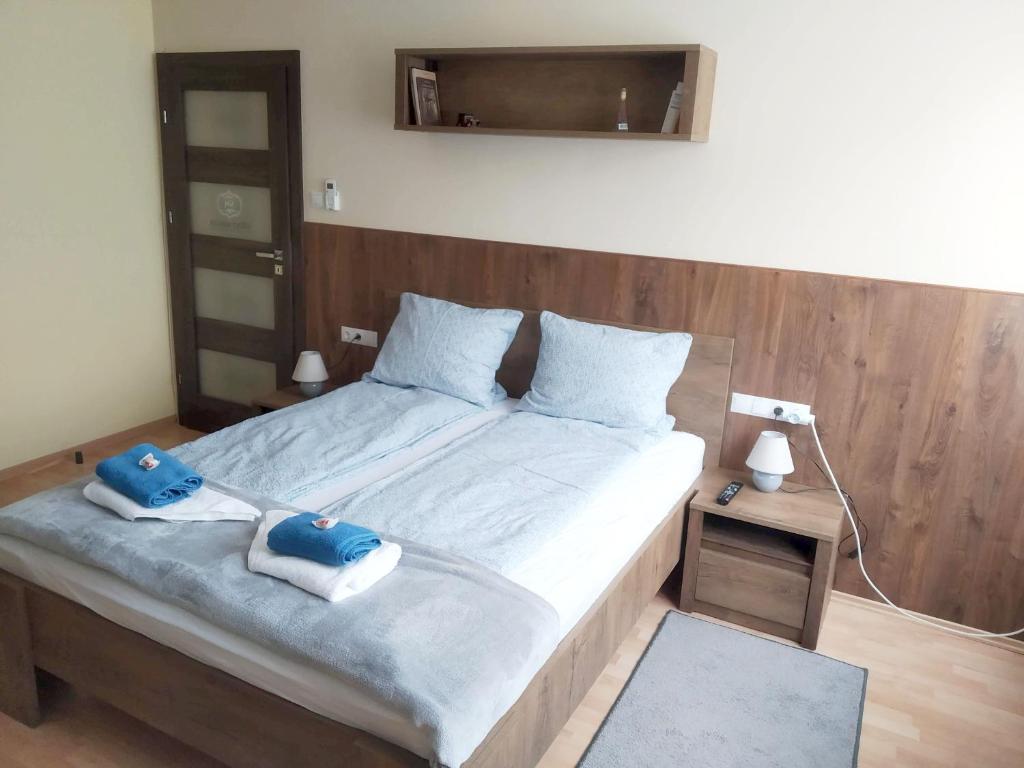 En eller flere senge i et værelse på Szent Miklós Apartman