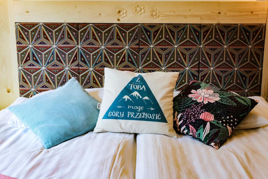 Posteľ alebo postele v izbe v ubytovaní NIECH TO SZLAK B&B