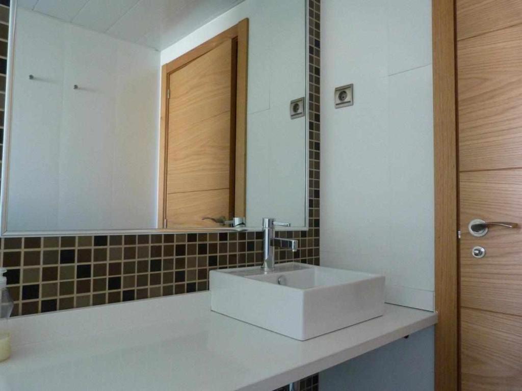 Un baño de Apartamentos Puerta de Ordesa