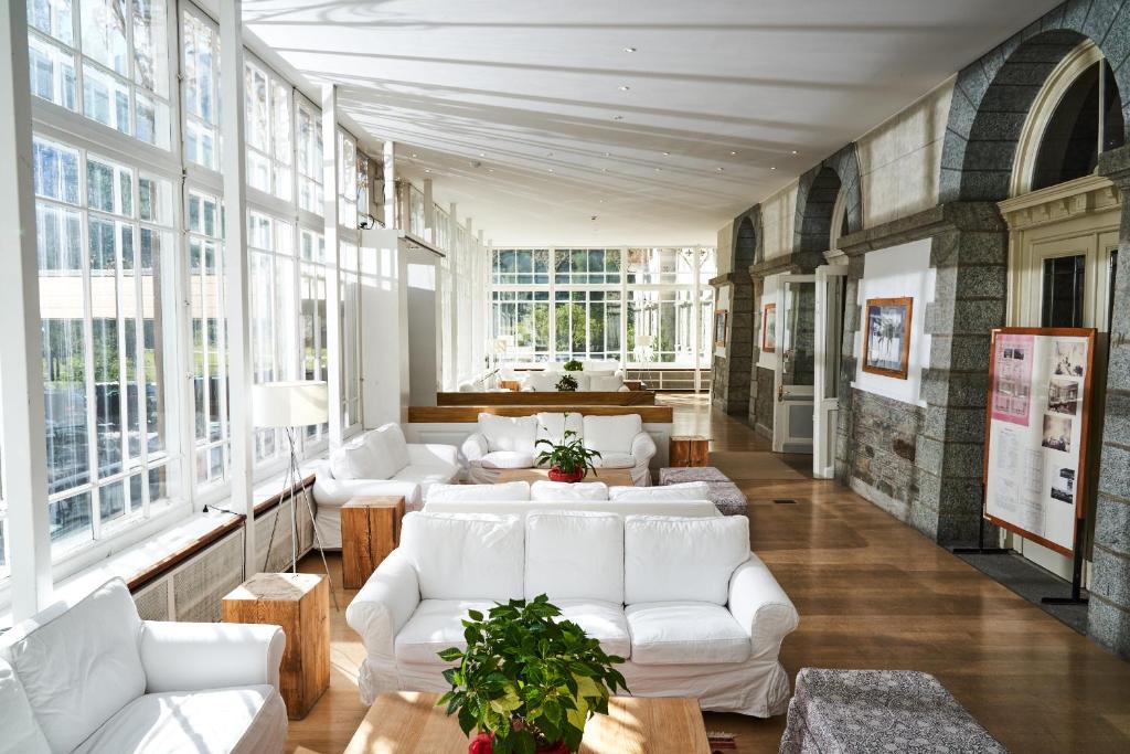 Posezení v ubytování Maloja Palace Residence Engadin-St Moritz CO2-Neutral
