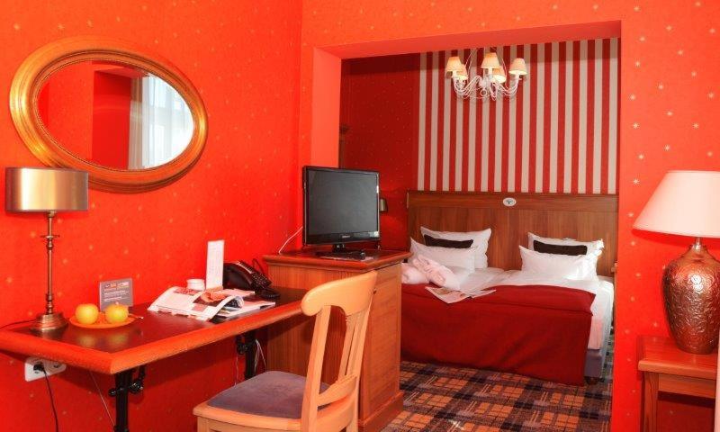 Postel nebo postele na pokoji v ubytování Hotel Schieferhof - GlasLUST
