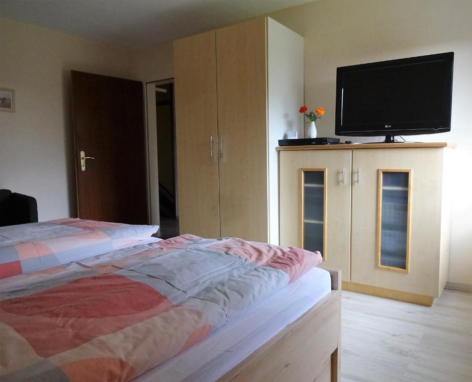 Postel nebo postele na pokoji v ubytování Ferienwohnung Schneemann
