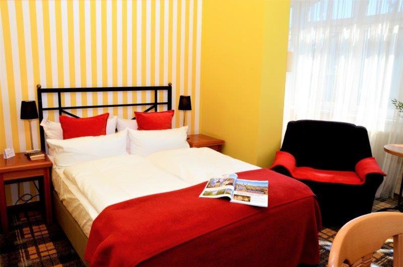 Postel nebo postele na pokoji v ubytování Hotel Schieferhof - GlasLUST