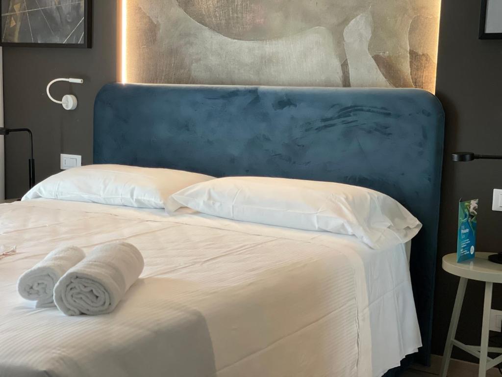 Postel nebo postele na pokoji v ubytování Hotel Iris Jesolo