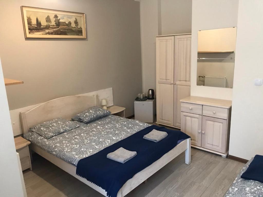 Postel nebo postele na pokoji v ubytování W Starej Leśnej
