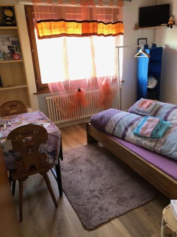 Postel nebo postele na pokoji v ubytování Nid d'abeilles