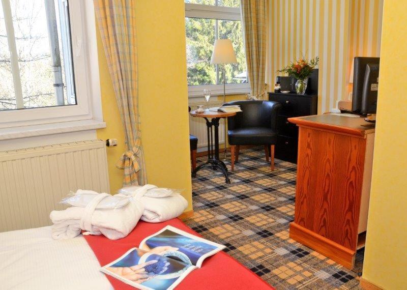 Postel nebo postele na pokoji v ubytování Hotel Schieferhof - GlasLUST