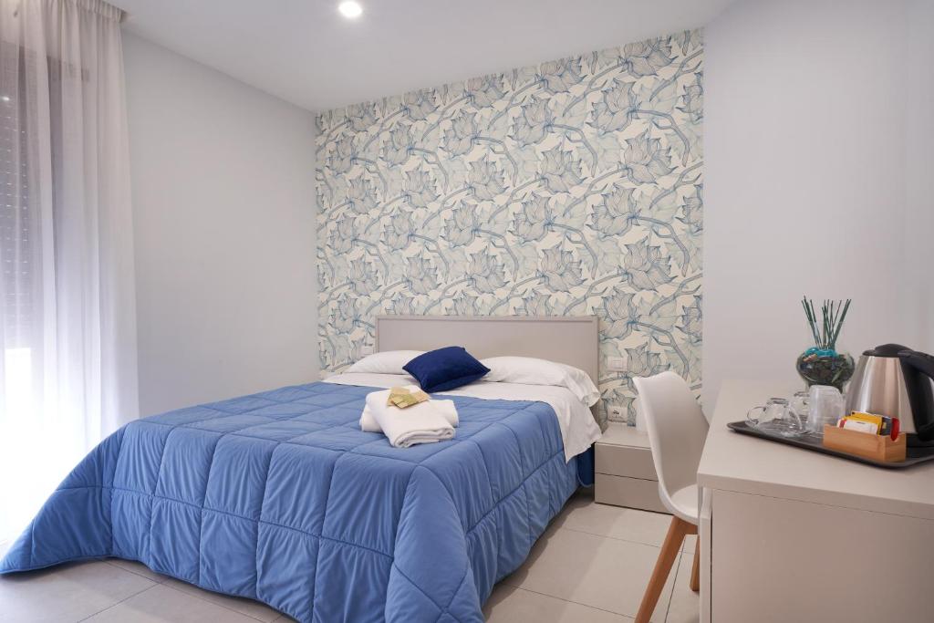 Postel nebo postele na pokoji v ubytování B&B Iside