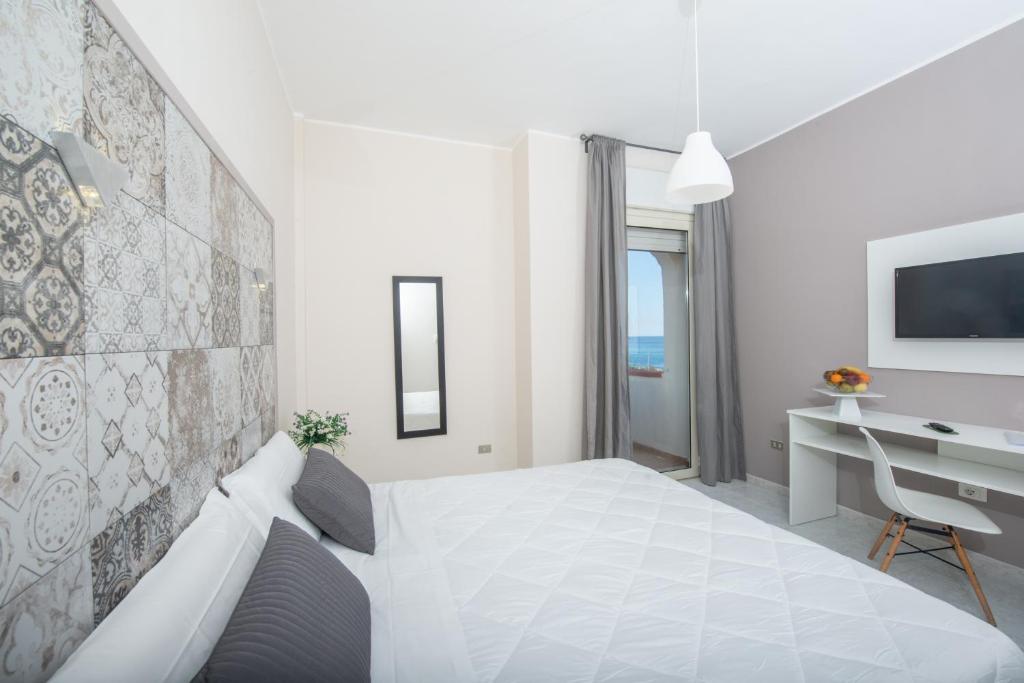 TV a/nebo společenská místnost v ubytování Hotel Club Eloro