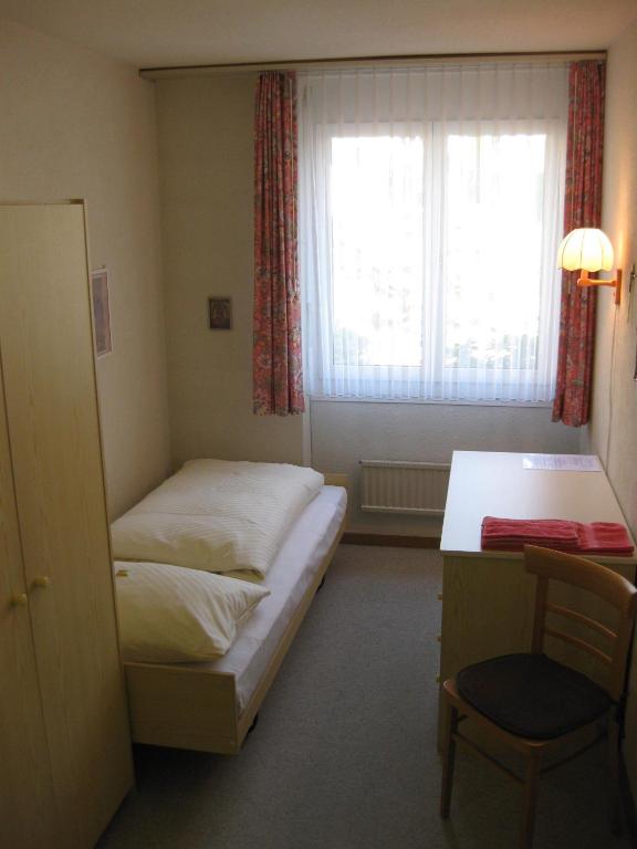 Postel nebo postele na pokoji v ubytování Haus St.Michael
