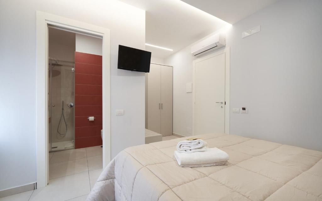 Postel nebo postele na pokoji v ubytování B&B Iside
