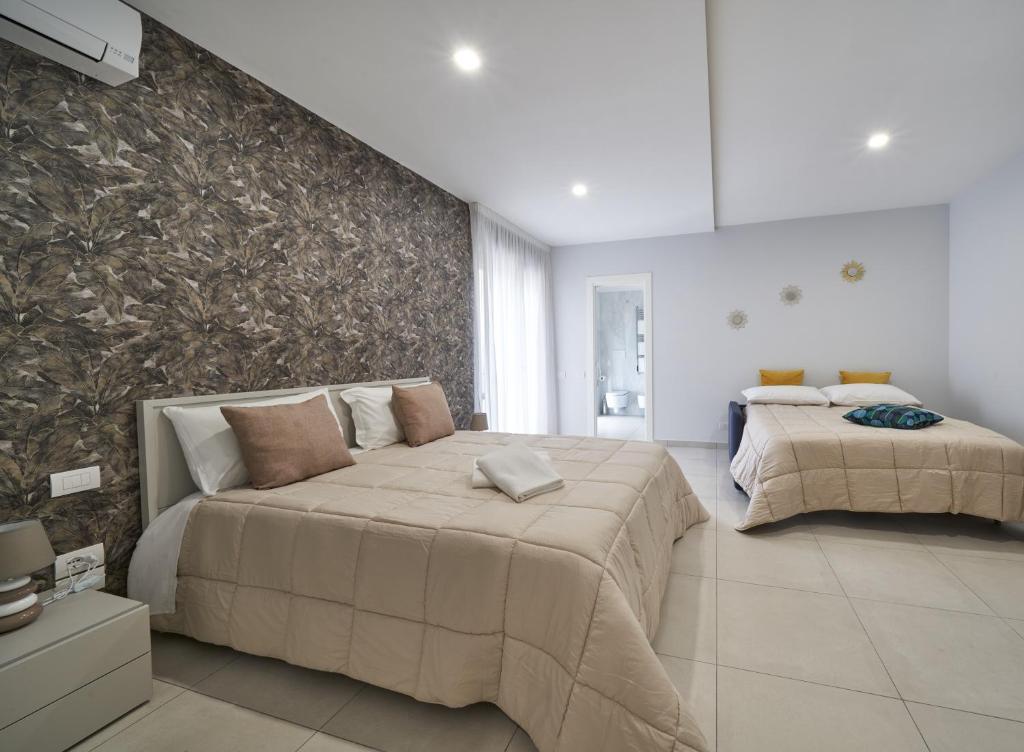 Postel nebo postele na pokoji v ubytování B&B Iside