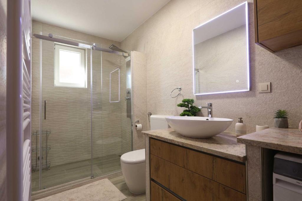 Kúpeľňa v ubytovaní Stone House Pridraga