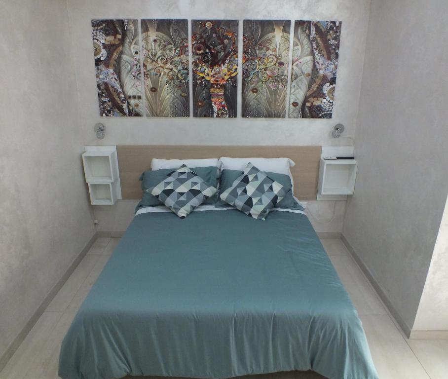 A bed or beds in a room at B&b Ilary Home