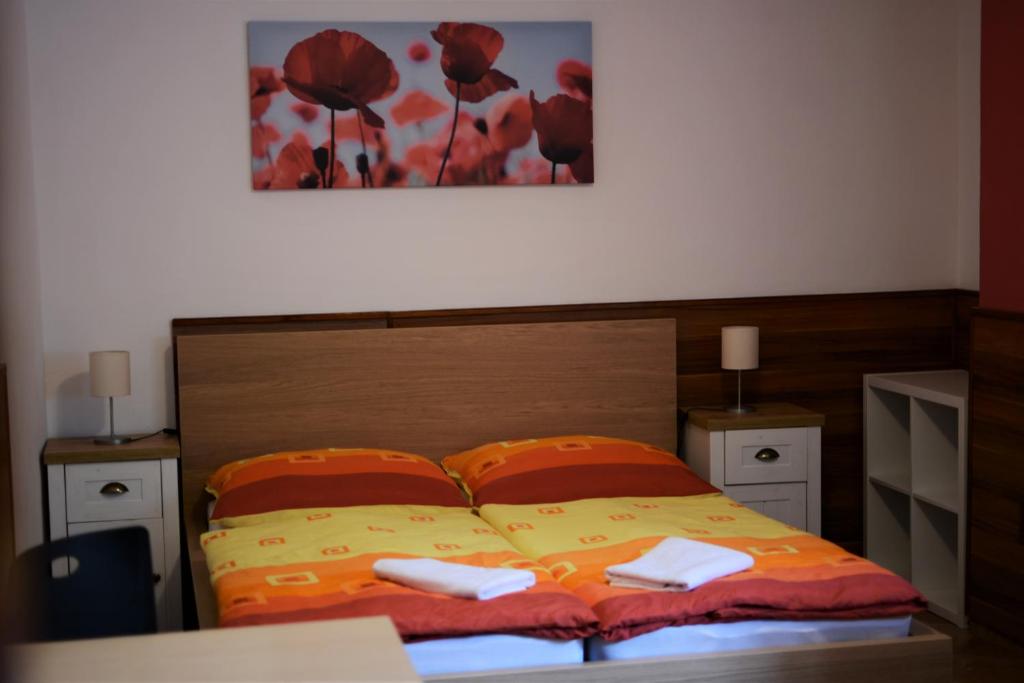 Postel nebo postele na pokoji v ubytování Penzion U Horských