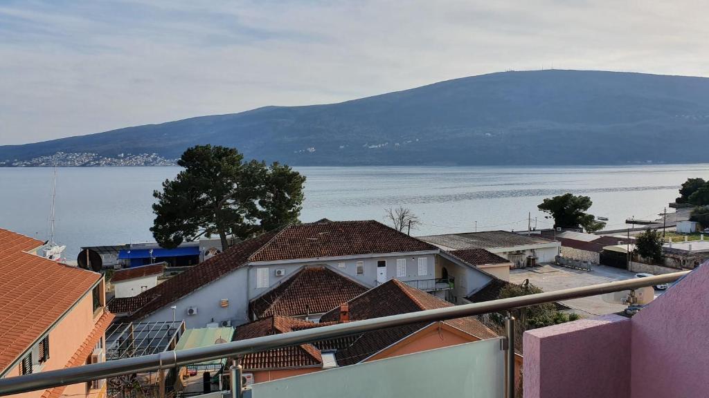 a view of a town with a view of the water at Sunrise Apartment in Baošići