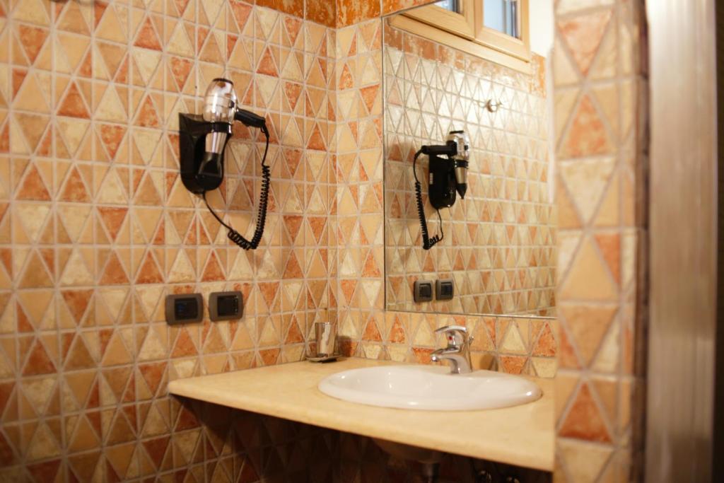 Kúpeľňa v ubytovaní Due Ponti Village