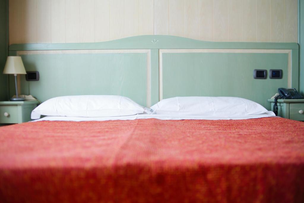Posteľ alebo postele v izbe v ubytovaní Due Ponti Village