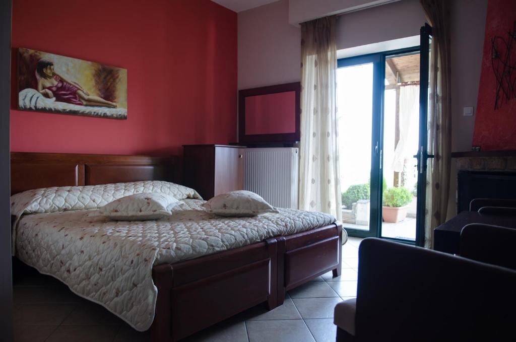 Postel nebo postele na pokoji v ubytování Guesthouse Liogerma