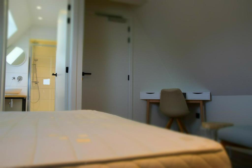 Postel nebo postele na pokoji v ubytování B&B Villa Mimosa