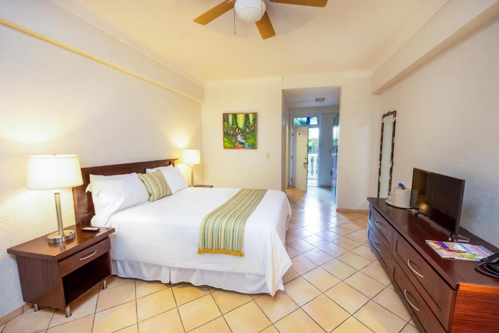 Postel nebo postele na pokoji v ubytování Hotel Villa Therese