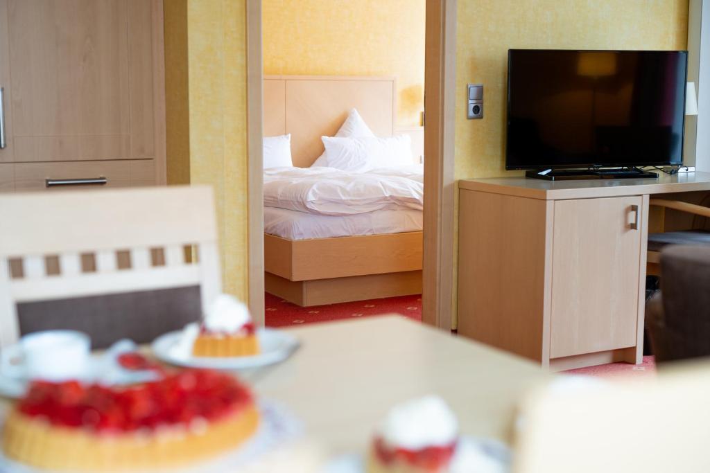 Postel nebo postele na pokoji v ubytování Landhaus Bergkrone